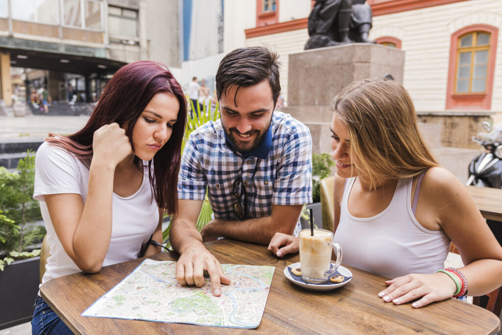 friends looking at a map for a restaurant